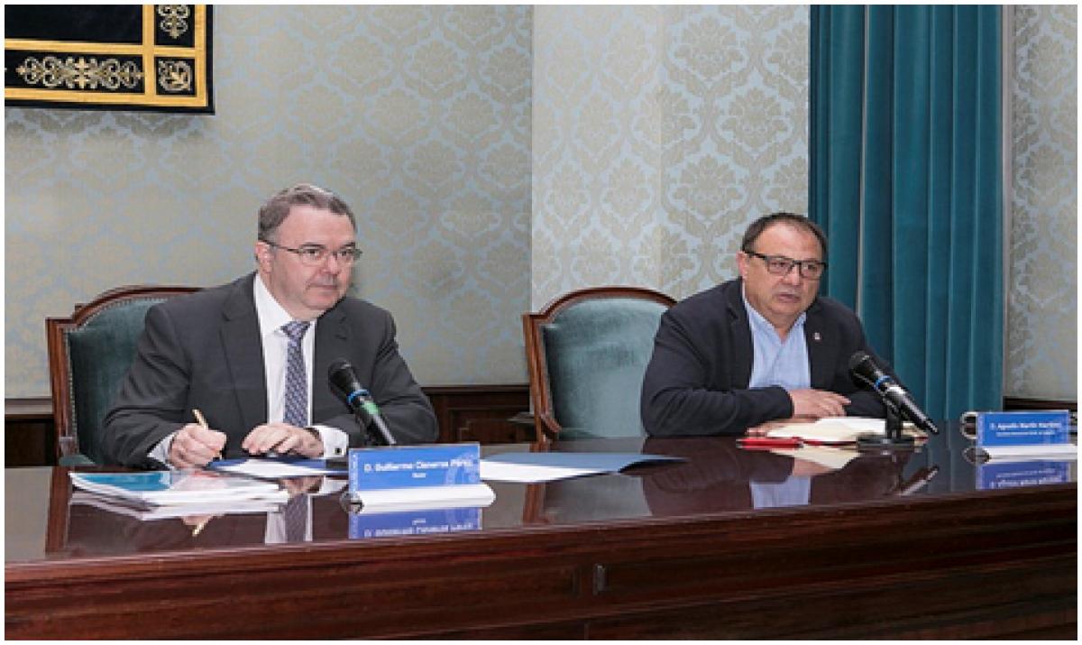 Guillermo Cisneros, rector de la UPM, y Agustín Martín, secretario general de CCOO de Industria, durante la apertura de la jornada